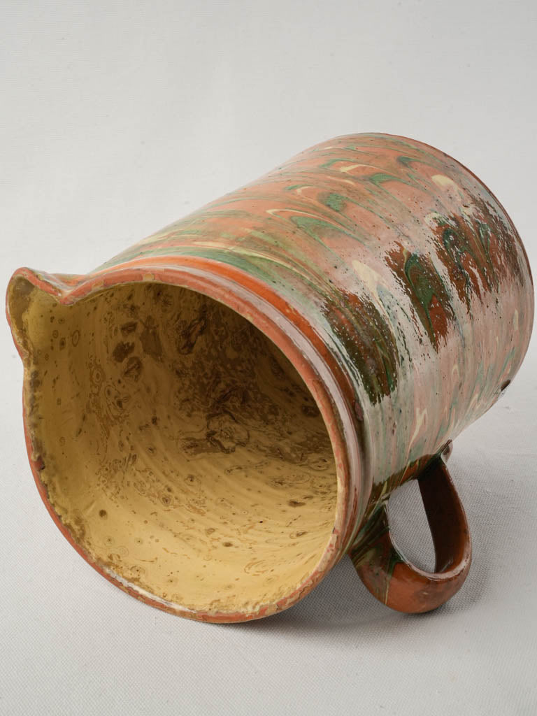 Colorful marbled terracotta jug