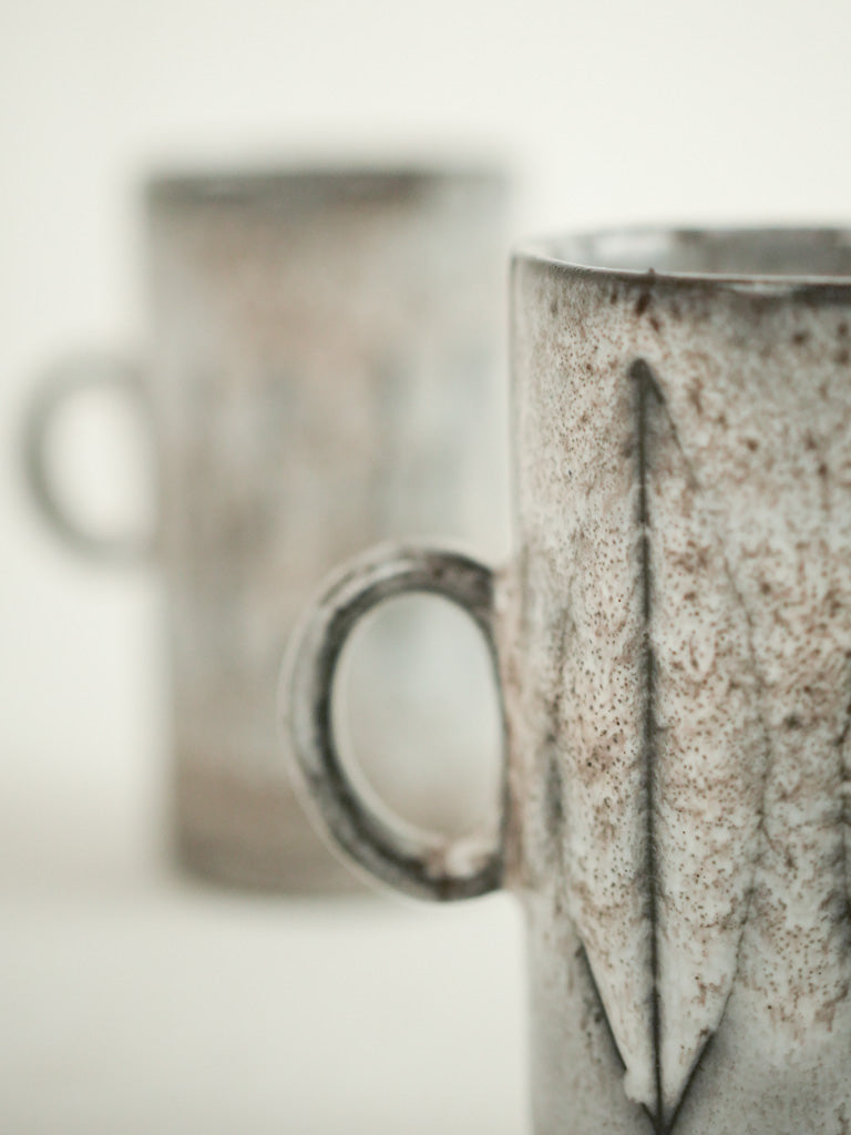Decorative French artisan ceramic mugs