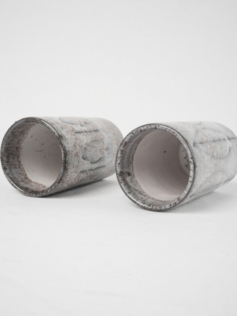 Manganese oxide and white enamel mugs