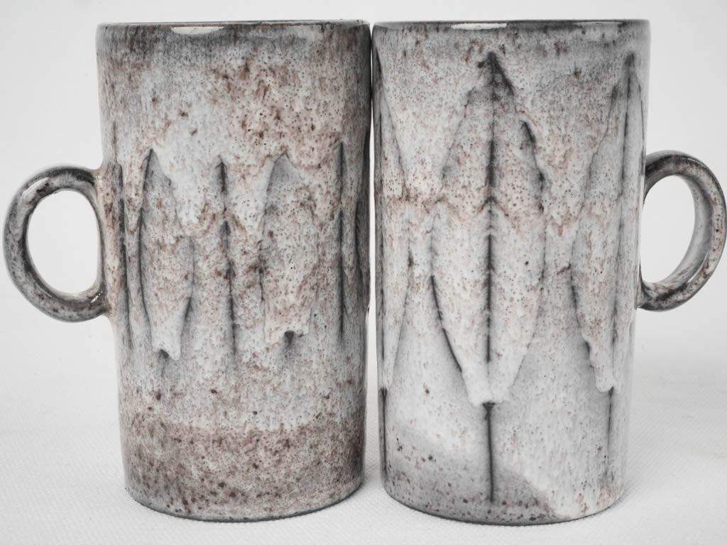 Engraved decor French ceramic mugs