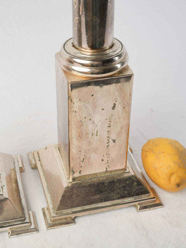 Polished tall decorative candle sticks