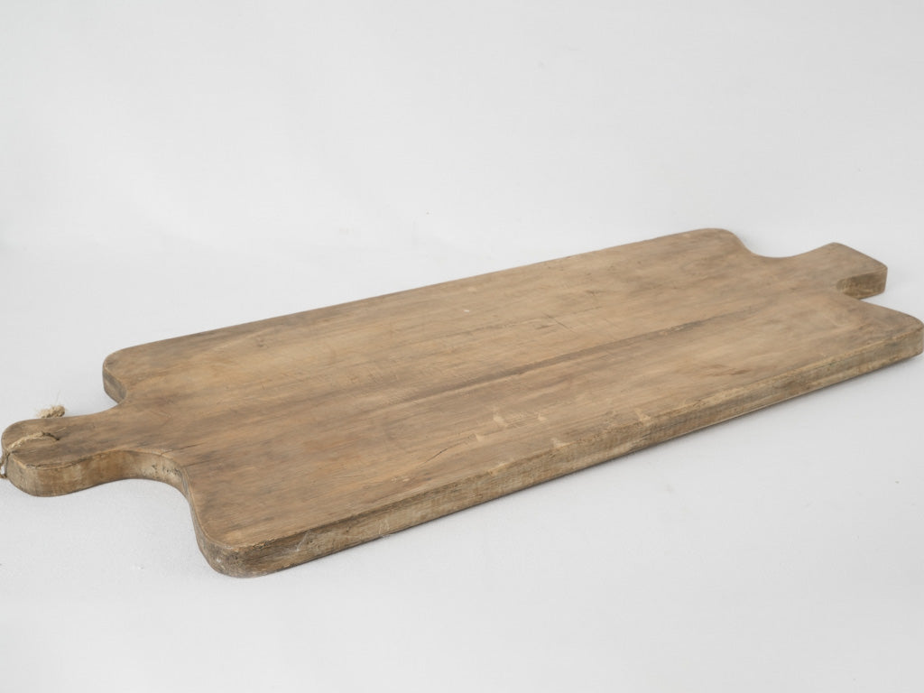Antique single-piece wooden chopping board