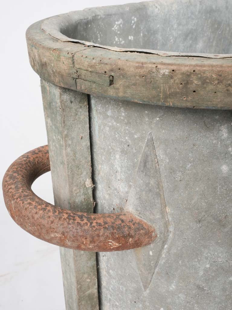Weathered zinc bathtub, iron details