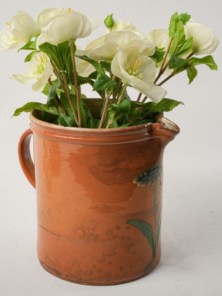 Elegant ocher terracotta pitcher