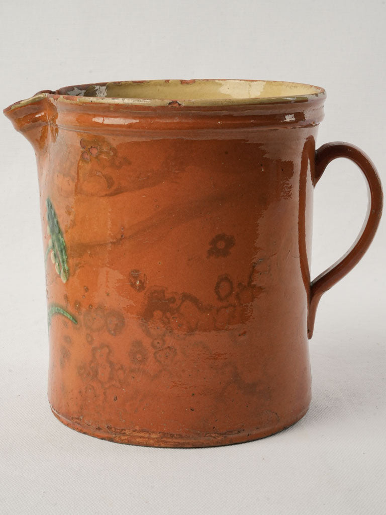 Decorative artisanal daisy pitcher