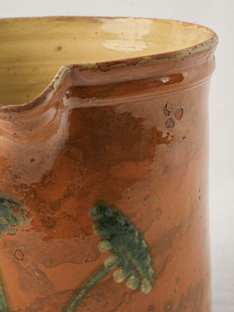 Handcrafted ocher terracotta carafe