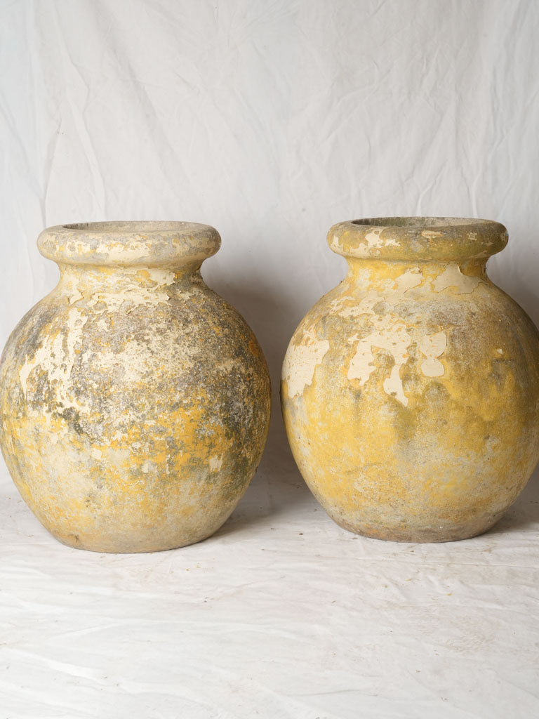 Textured weathered yellow vessels
