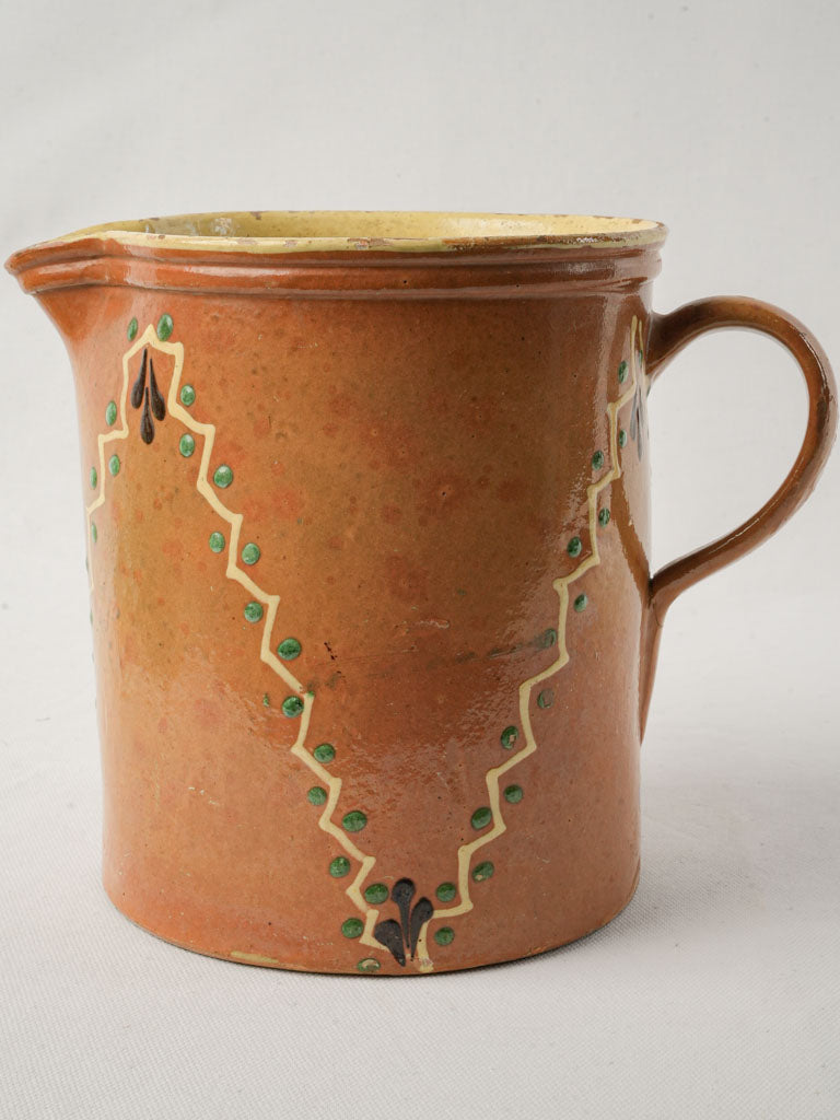 Rustic ocher zigzagged pottery