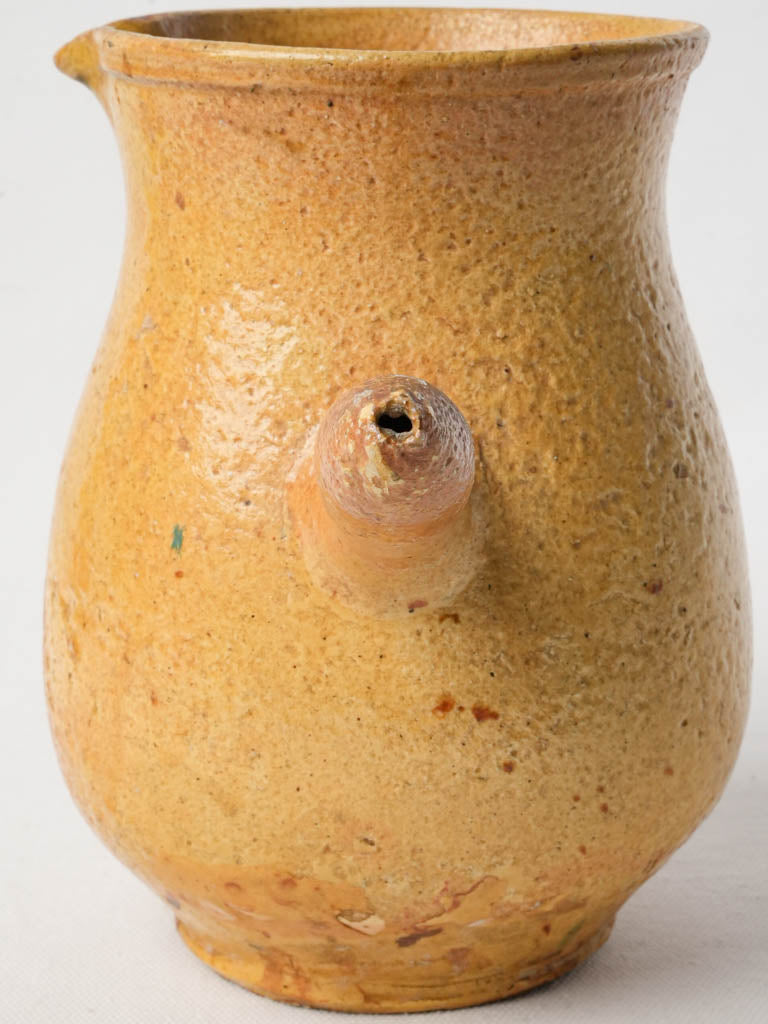 Antique-style patina-finished pitcher