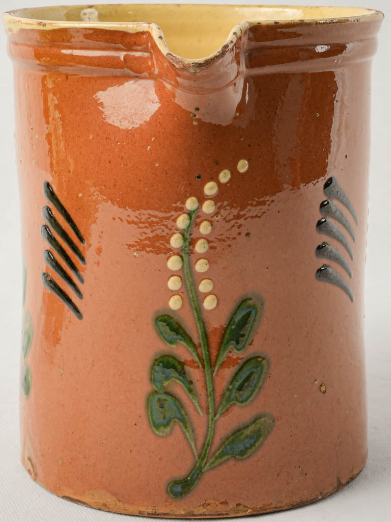 Ochre and green vessel