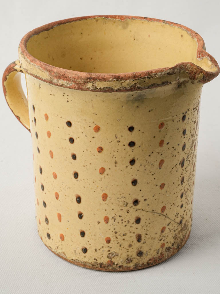 Ochre-spotted pastel pitcher
