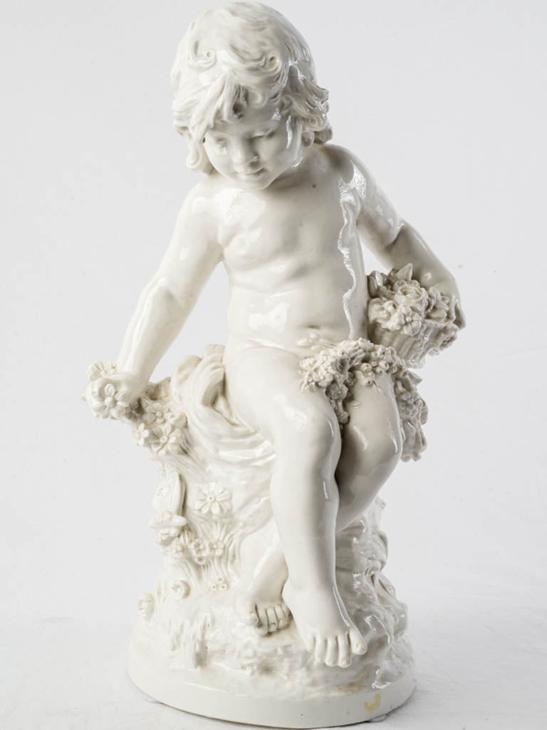 Antique Neapolitan porcelain cherub figurine