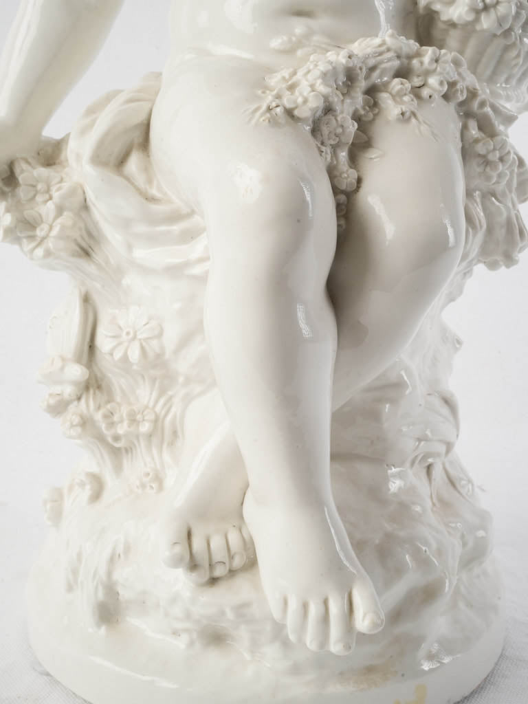 Detailed Rococo style cherub statue
