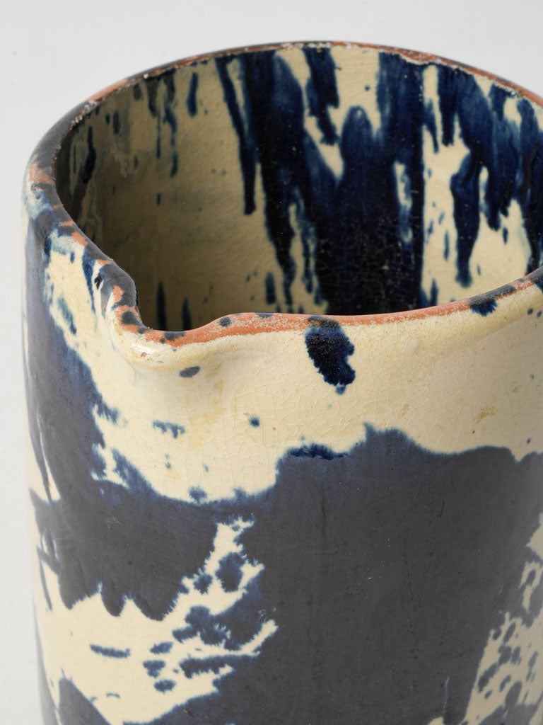 Traditional jaspé motif ceramic jug