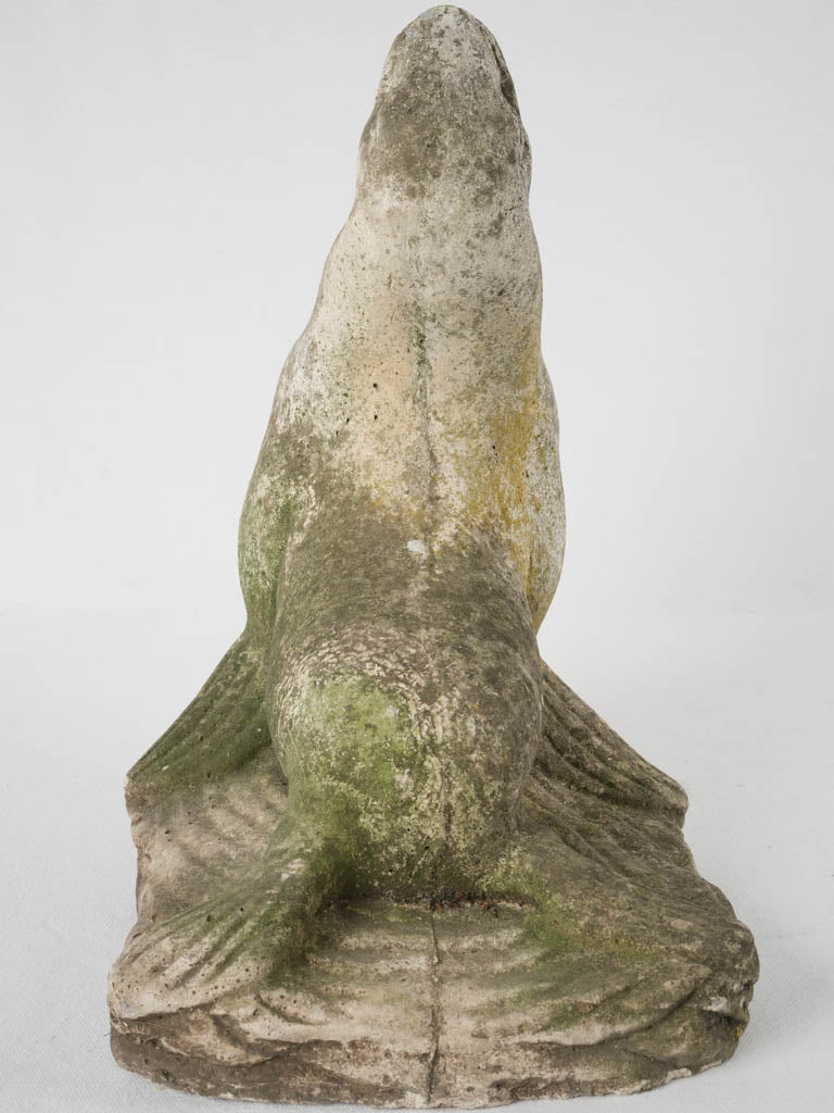 Worn seal reconstituted stone fountain