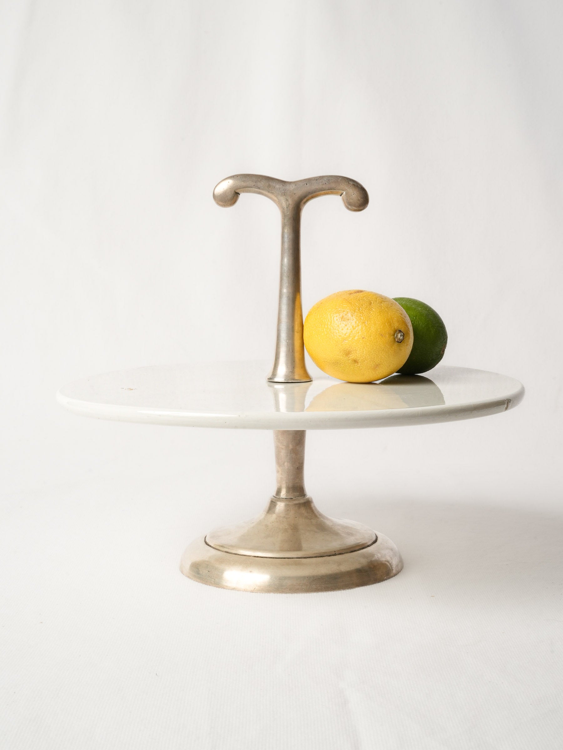 Revolving Ceramic Cake Stand with Silver Metal Pedestal