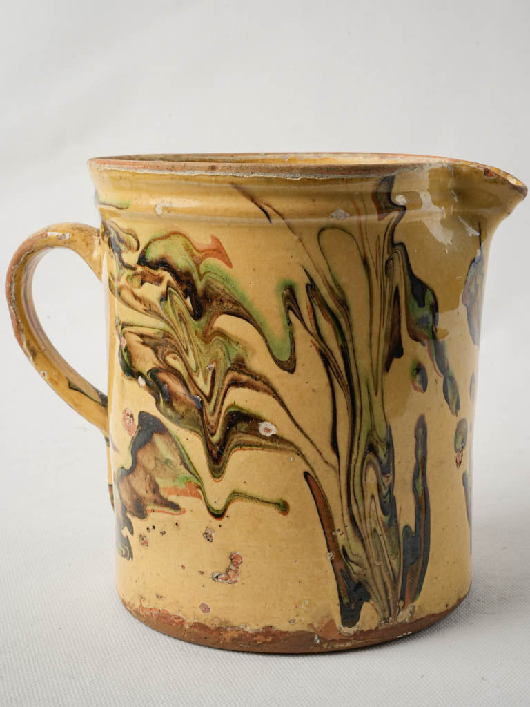 Traditional yellow and brown pitcher