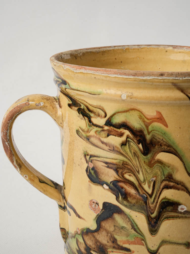 Artistic swirling green pitcher