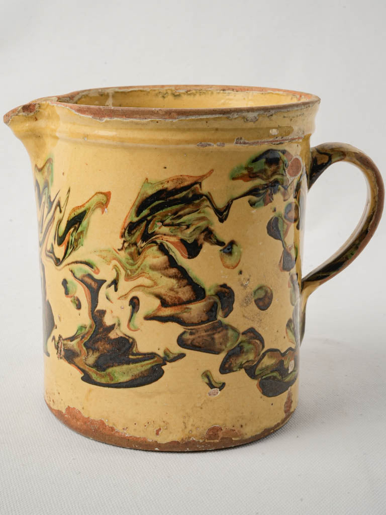Decorative European pottery pitcher