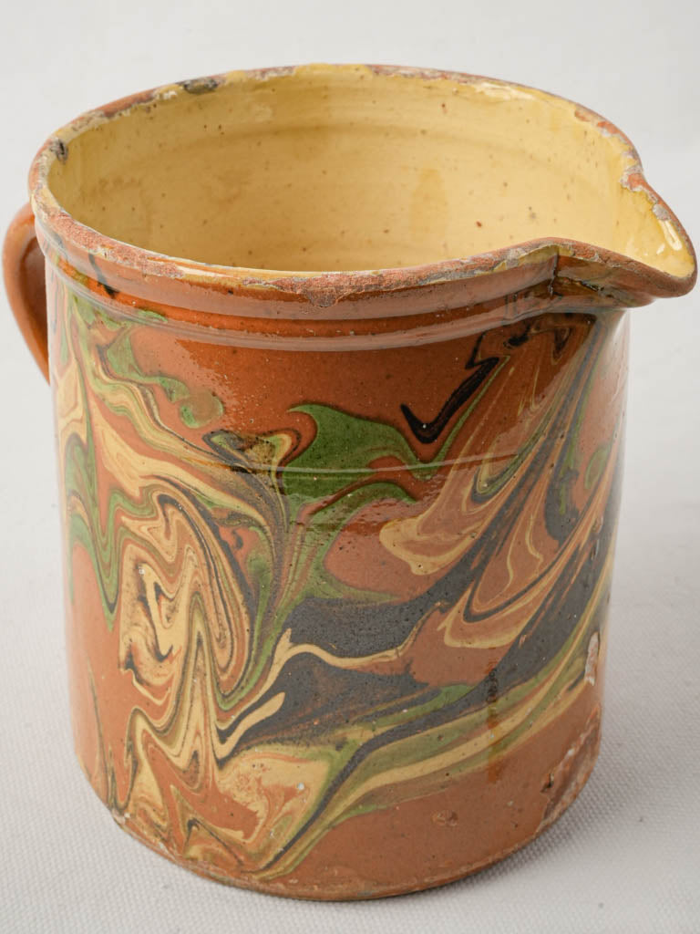 Vibrant yellow-green streaked jug
