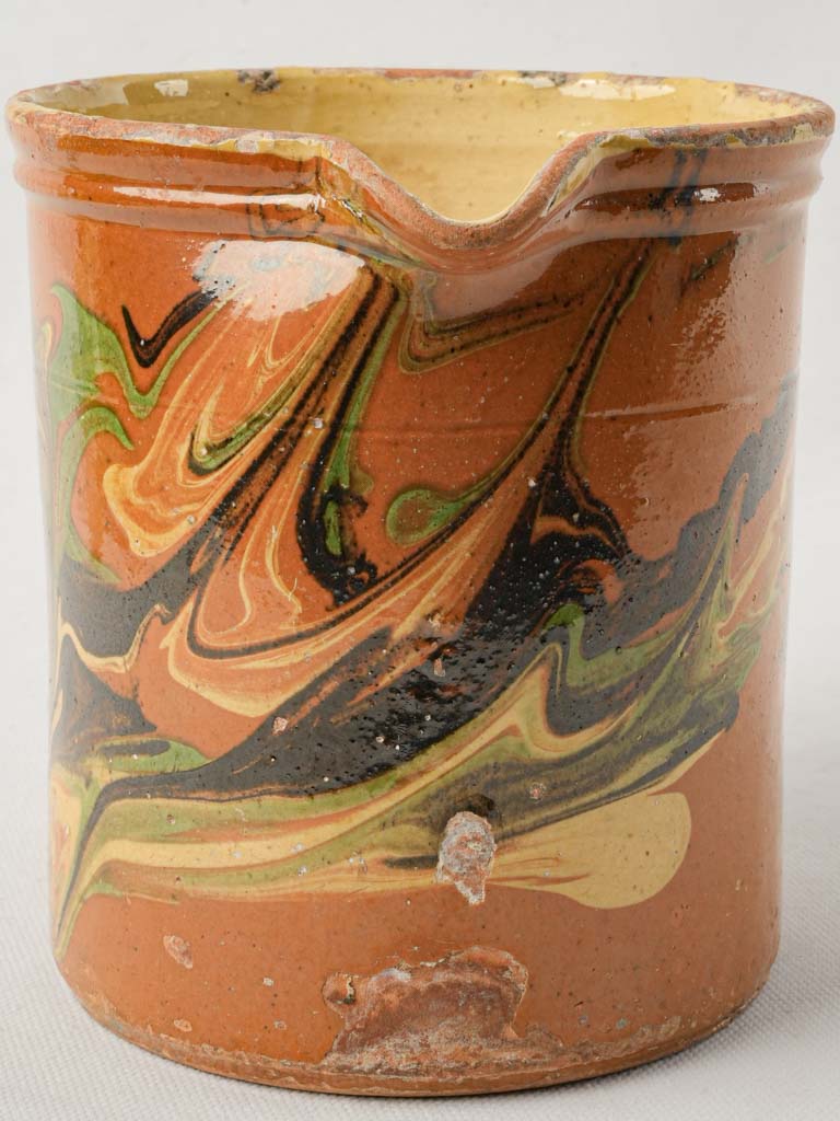 Striking red ochre terracotta pitcher