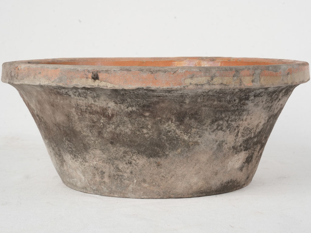 Timeworn decorative Provençal cooking vessel