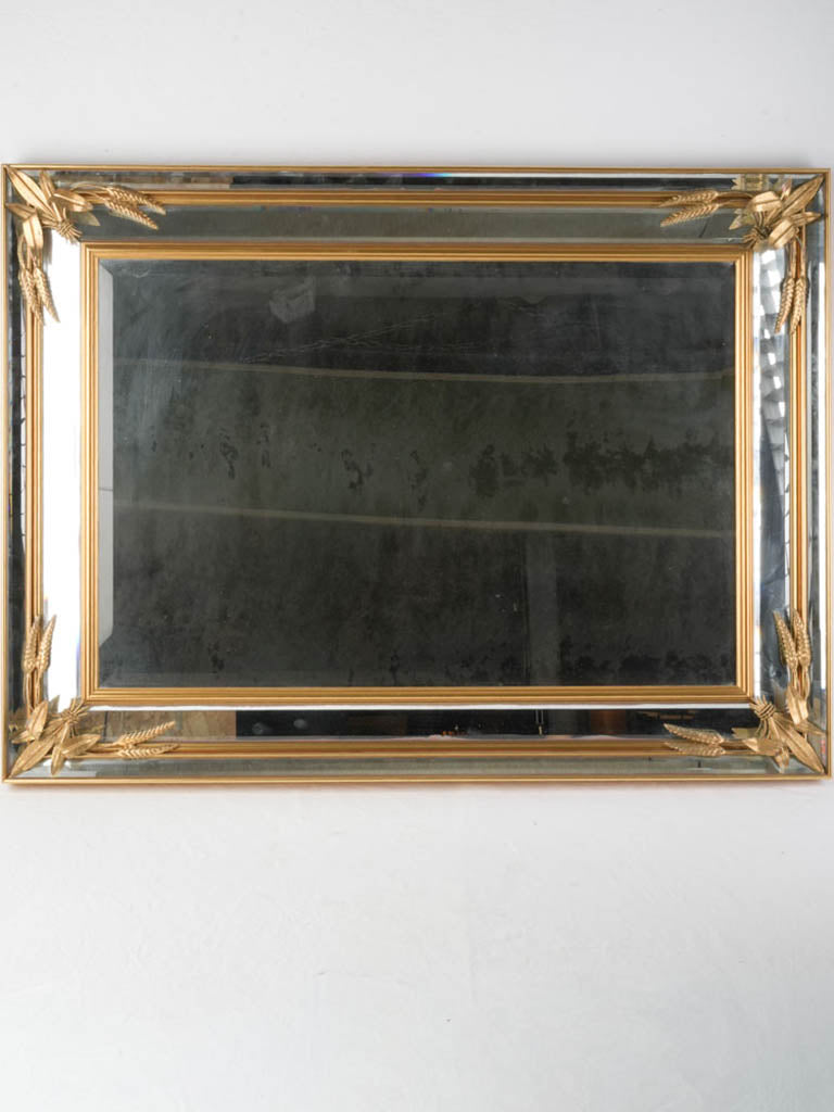 Hollywood Regency beveled glass mirror.