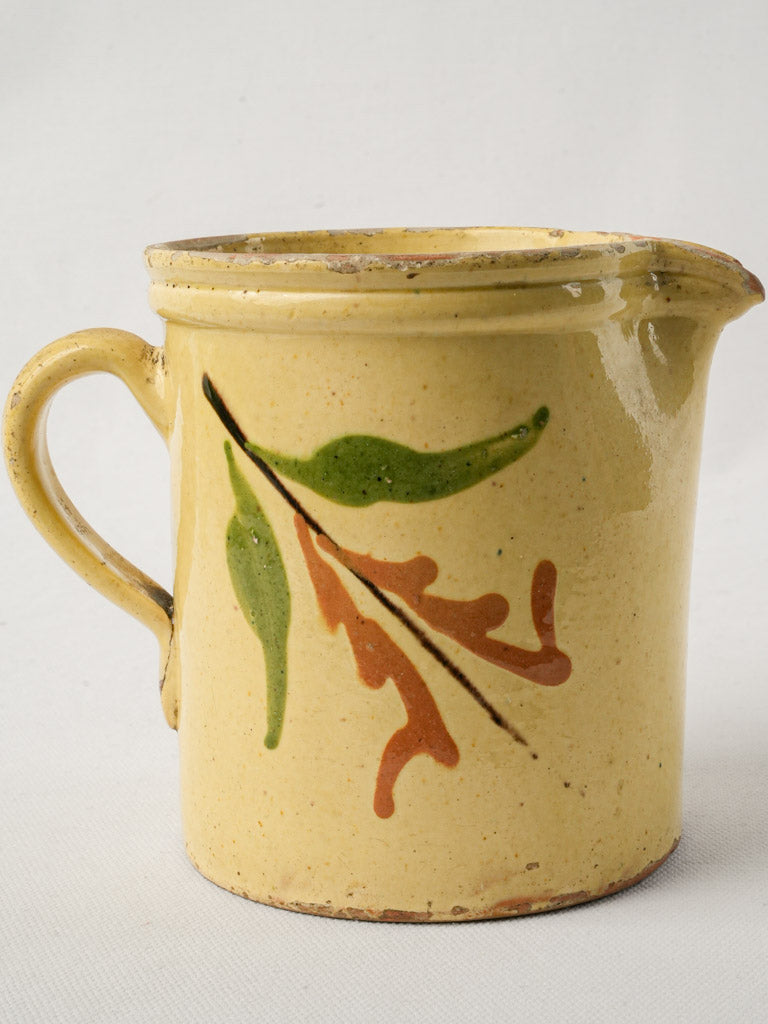 Charming ocher accented creamer