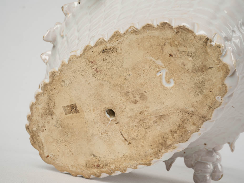 Classic, white-glazed ceramic fruit sculpture