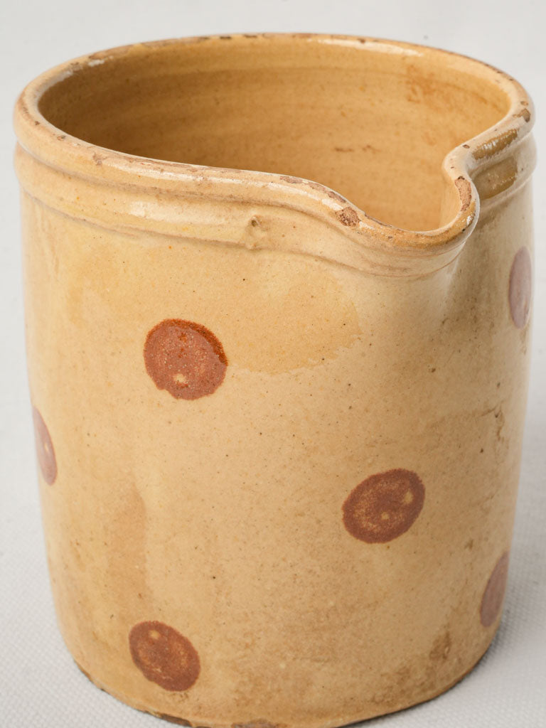 Delightful yellow ocher creamer