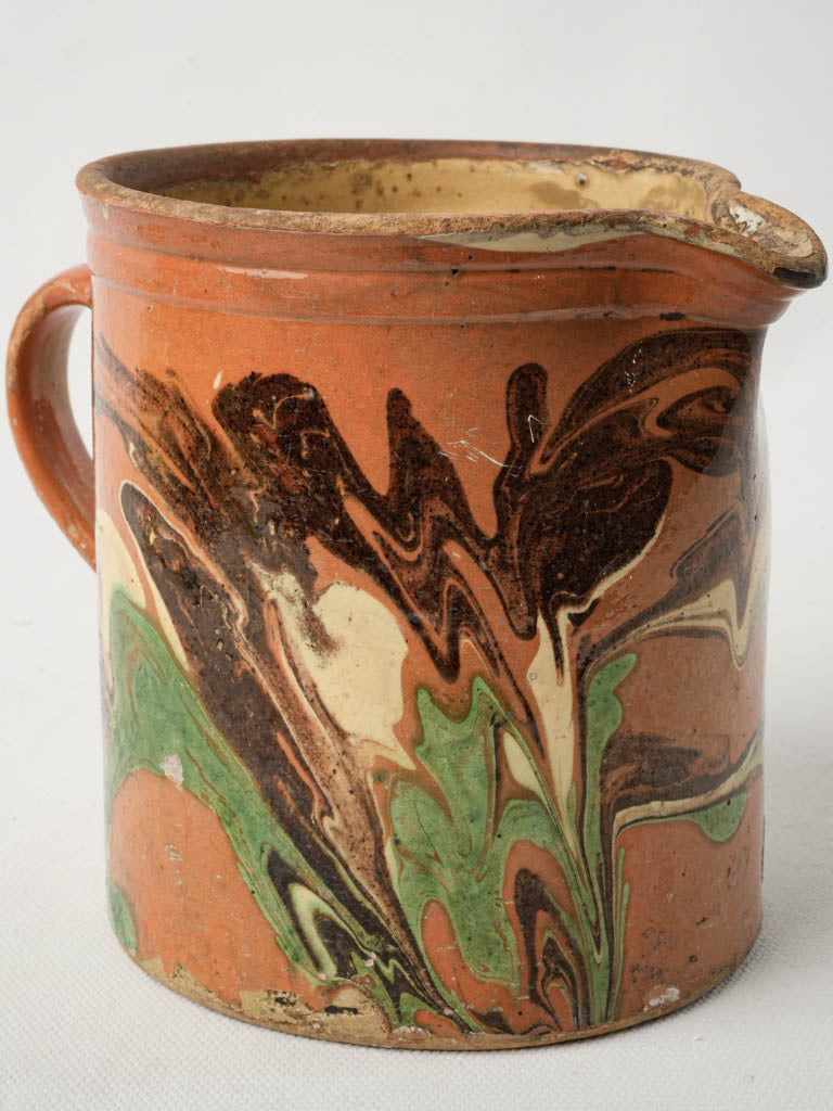 Marbled effect ceramic pitcher