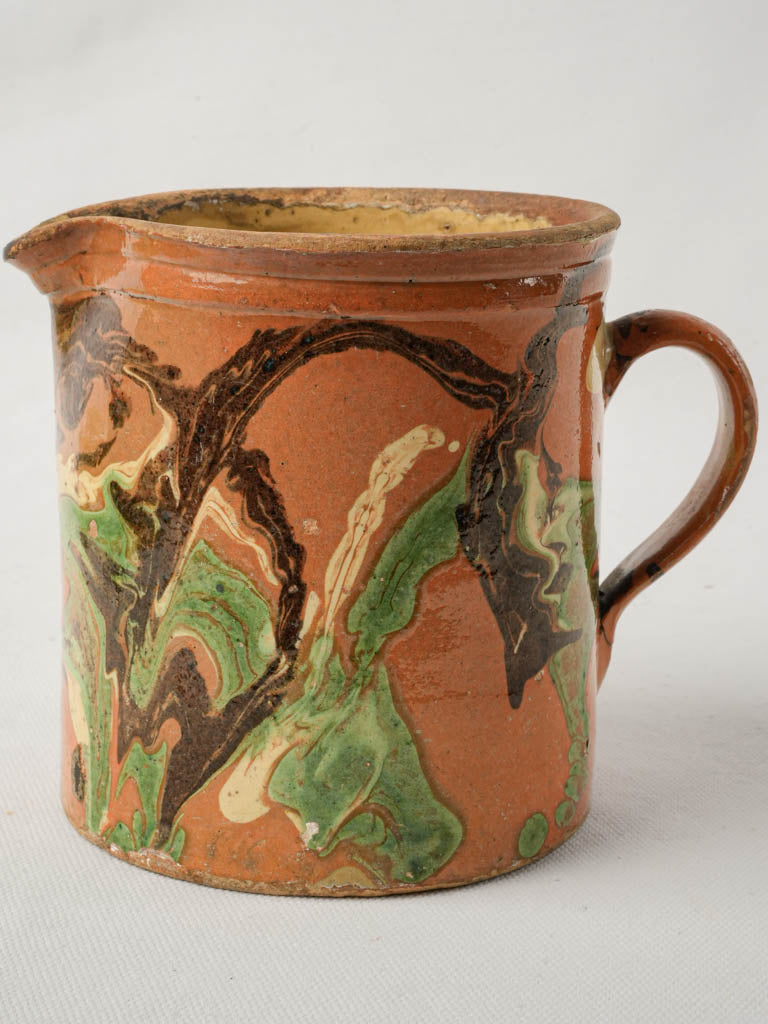 Dramatic streaks pottery pitcher