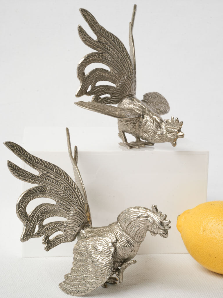 Lustrous vintage silvered cockerels figurines