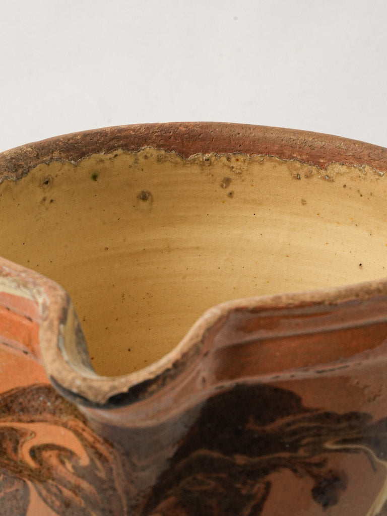 Fluid design ceramic pitcher