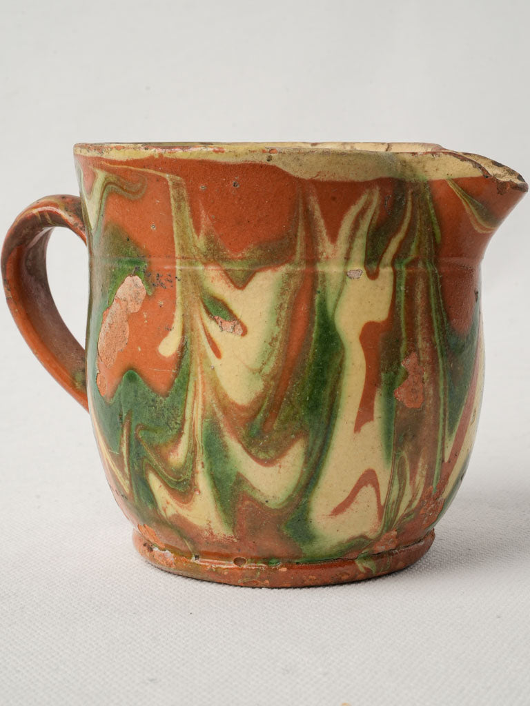 Timeworn decorative creamer pitcher