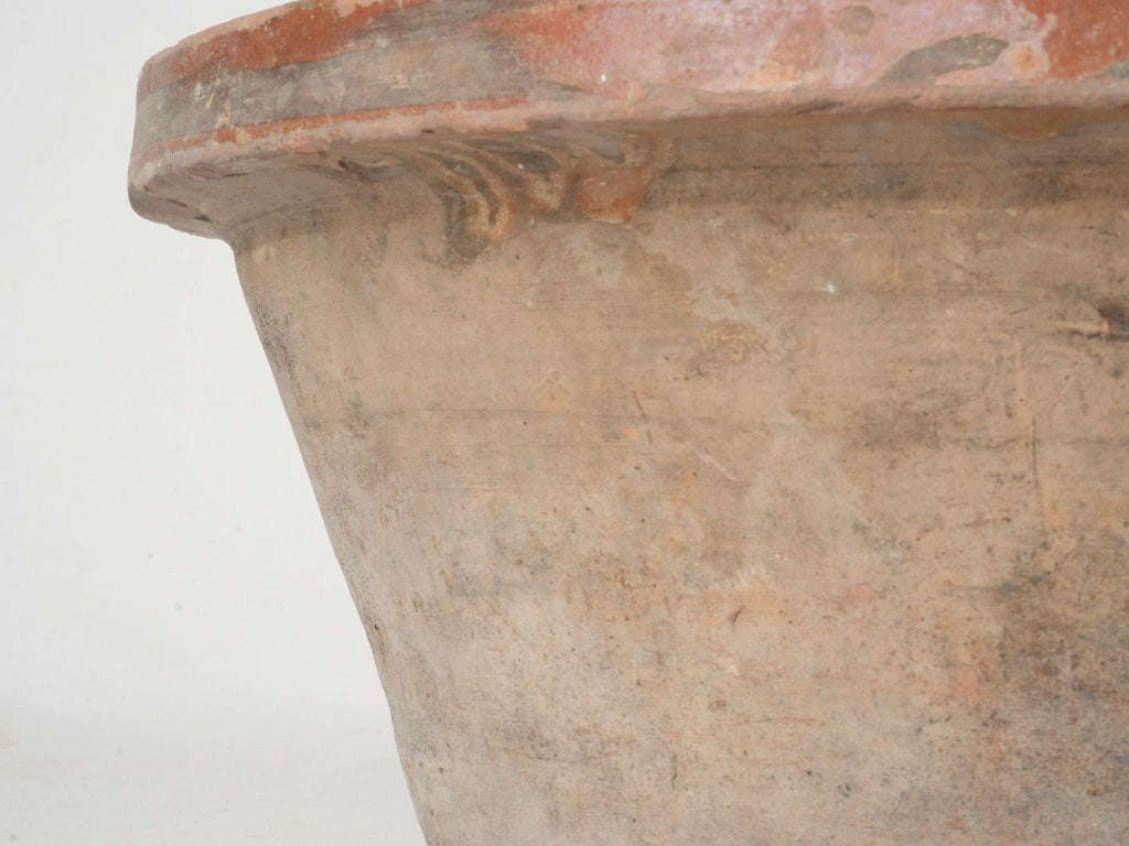 Collectible maroon-hued pottery item