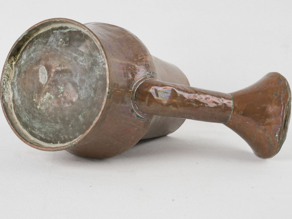 Classic, aged French countryside watering can