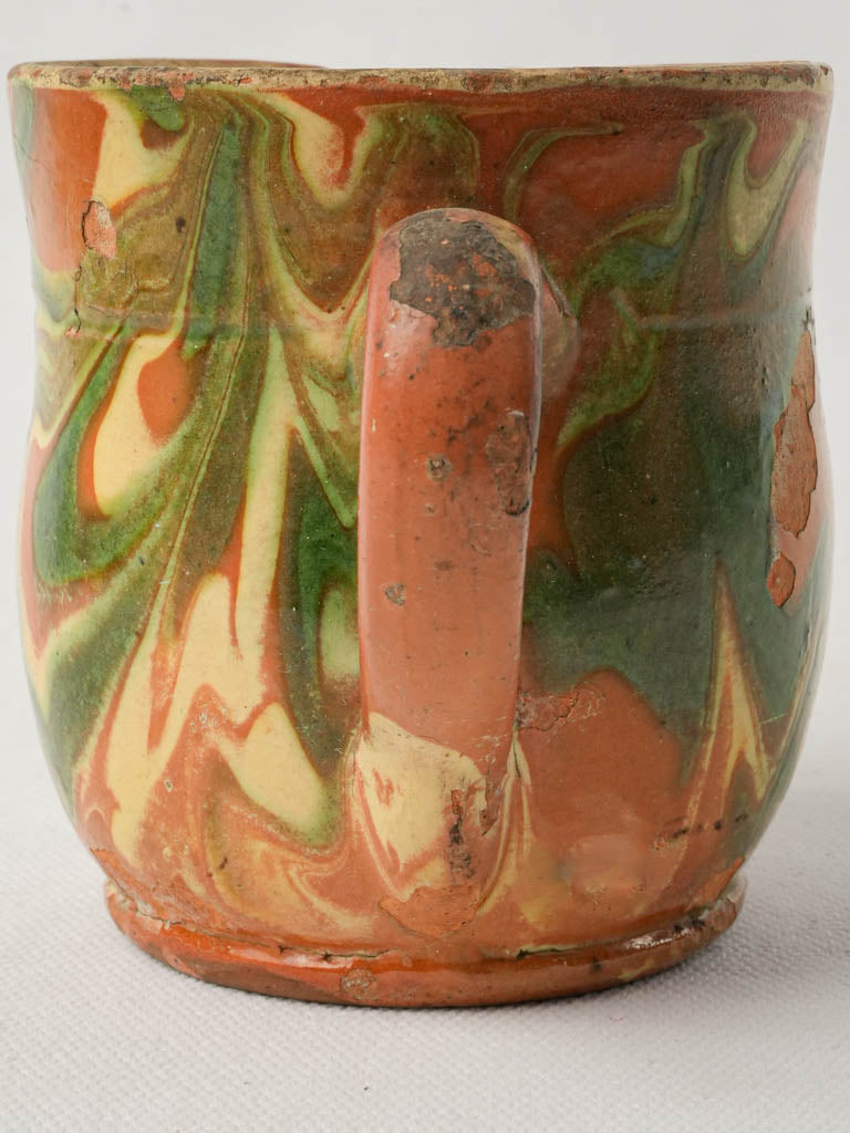 Artistic petite pottery creamer