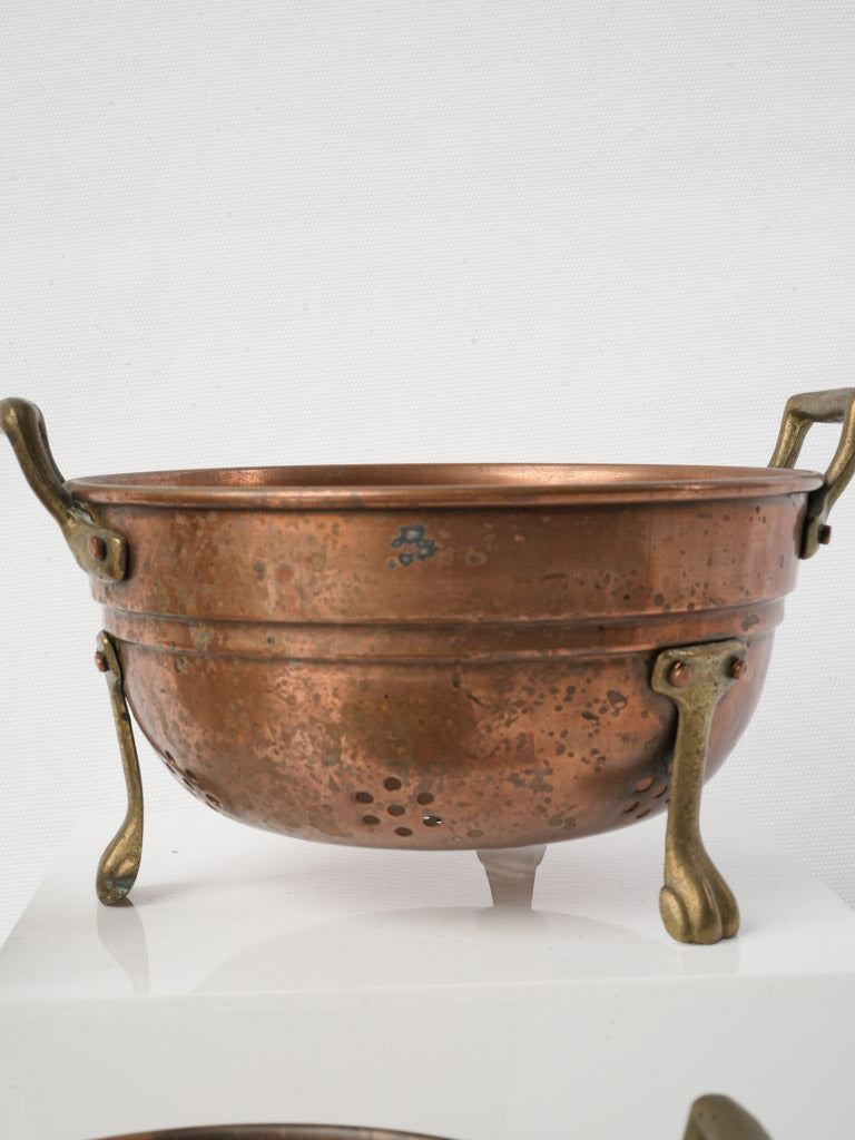Ornately detailed copper culinary pieces