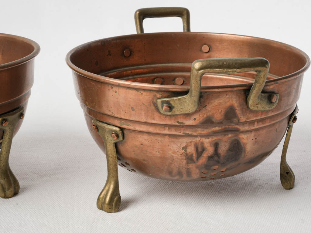 Robust riveted-handled copper colanders