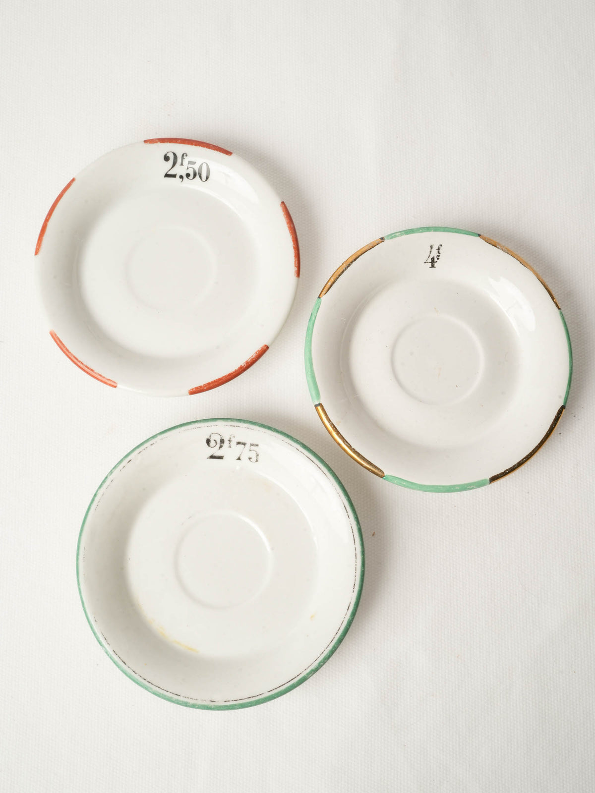 Set of Three French Bistro Porcelain Price Saucers