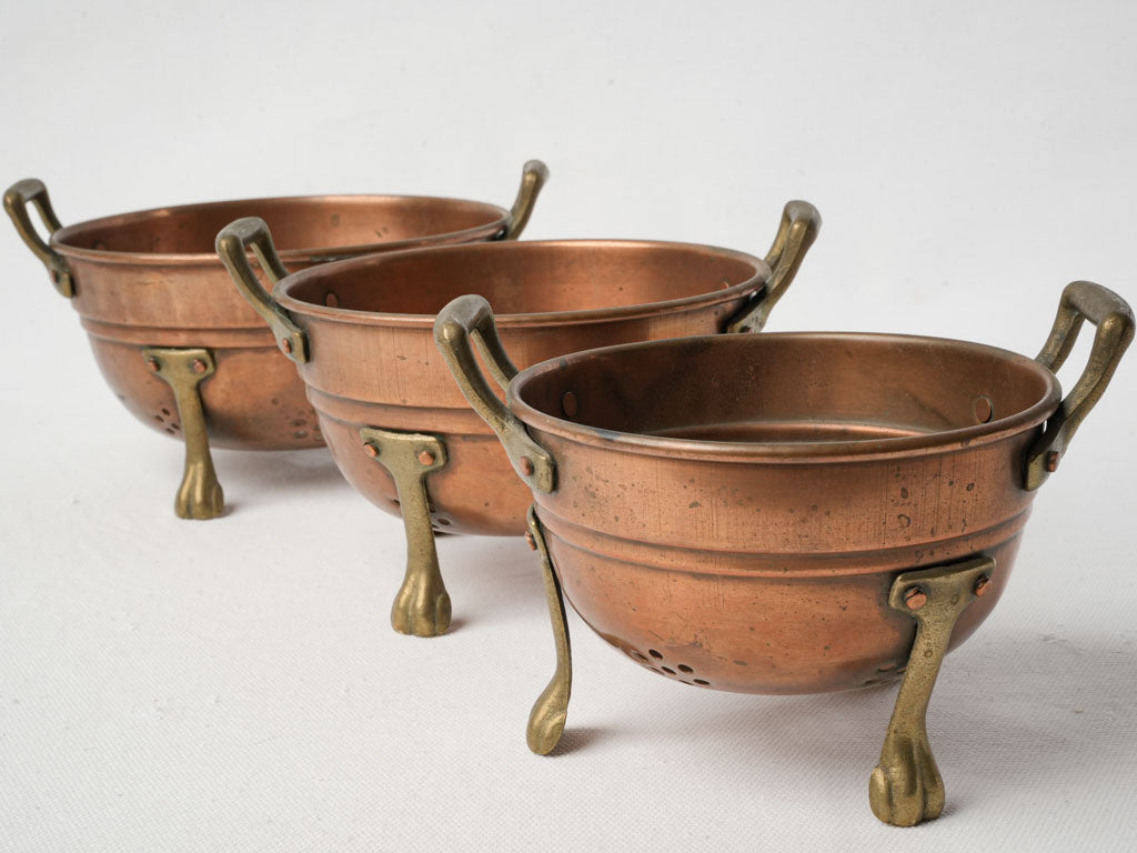 Warm-toned copper colander selection