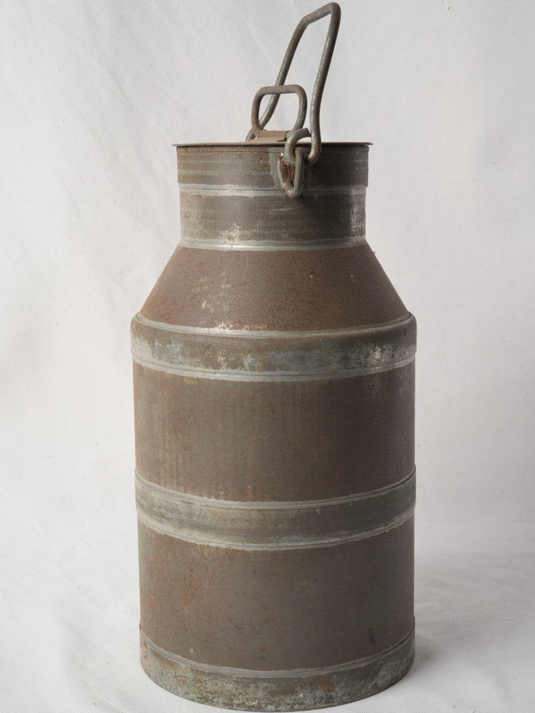 Weathered tinplate collectible milk churn
