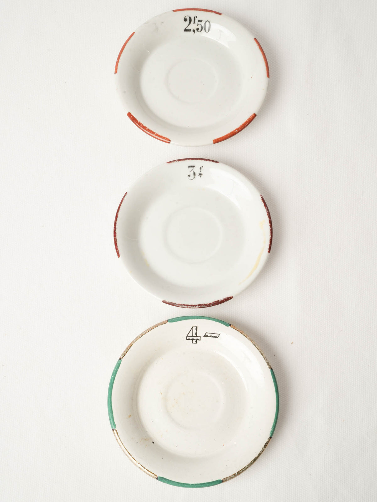 Three Vintage French Bistro Porcelain Saucers 5"