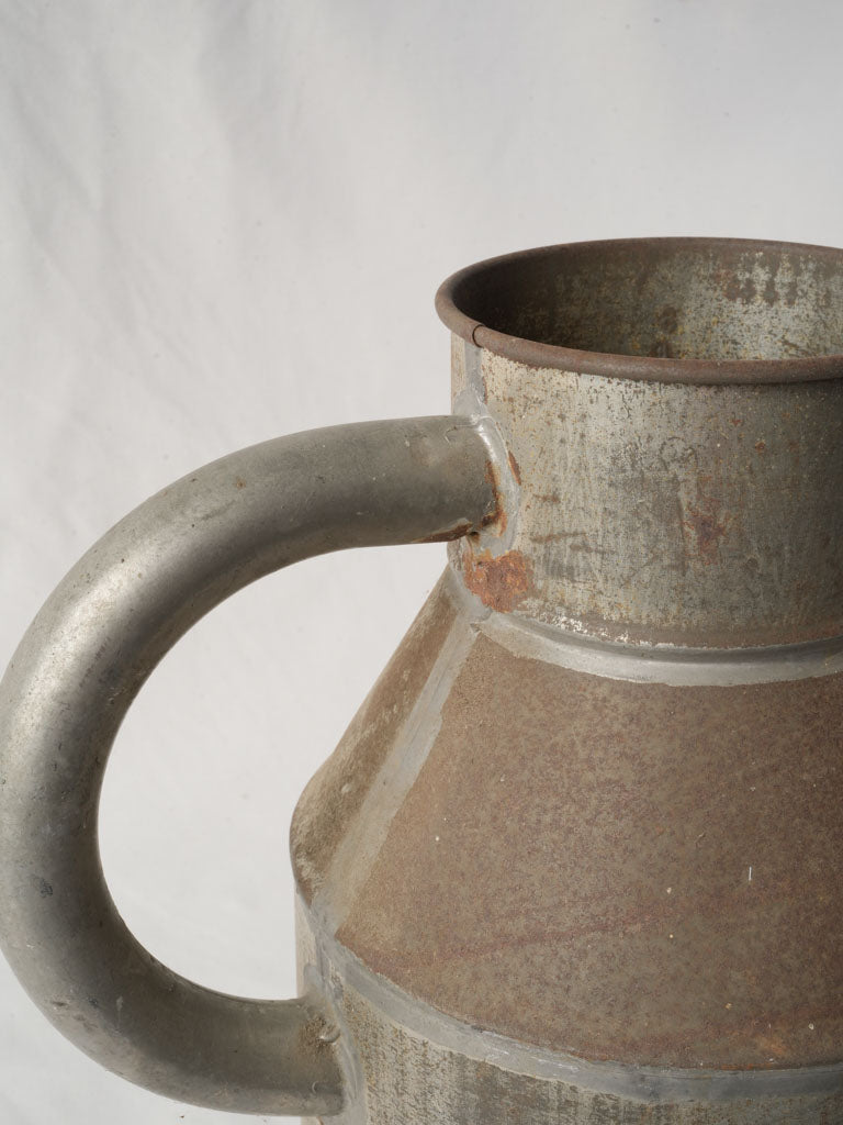 Decorative vintage tinplate watering can