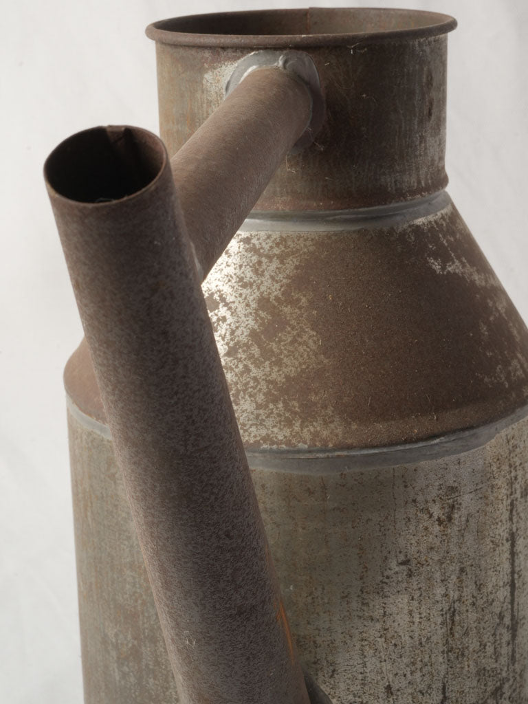 Oxidized brown antique watering can