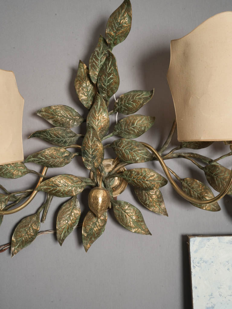 Sculptural ornate wall light fixture