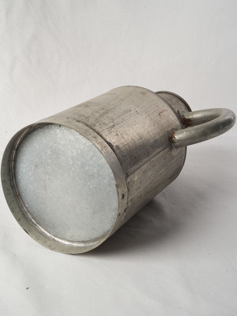 Graphic installation vintage watering can