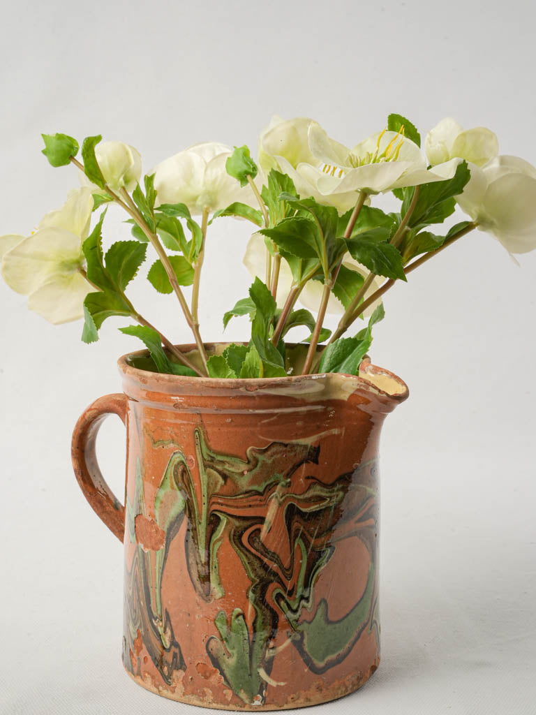 Antique rustic terracotta pitcher