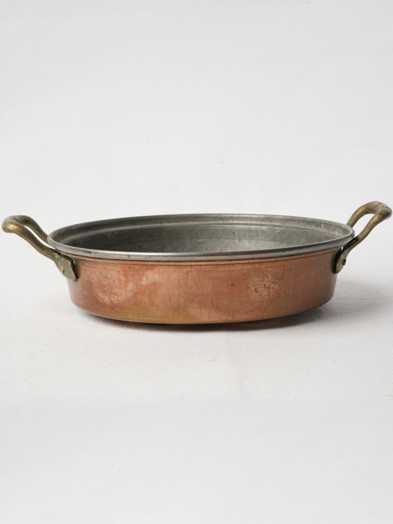 Aged patina escargot cooking pan